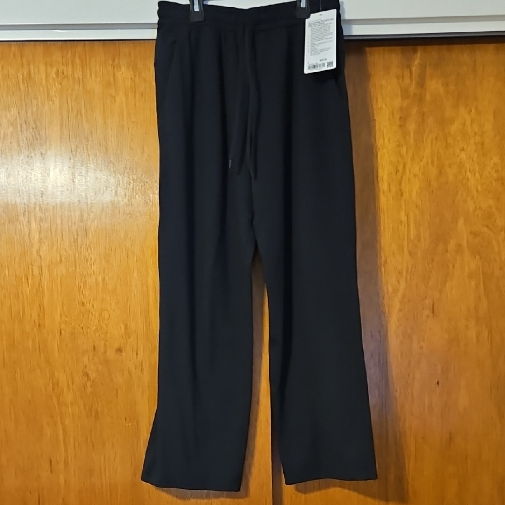 NWT Lululemon Womans Black Wide leg pants, with pull cord waist.
